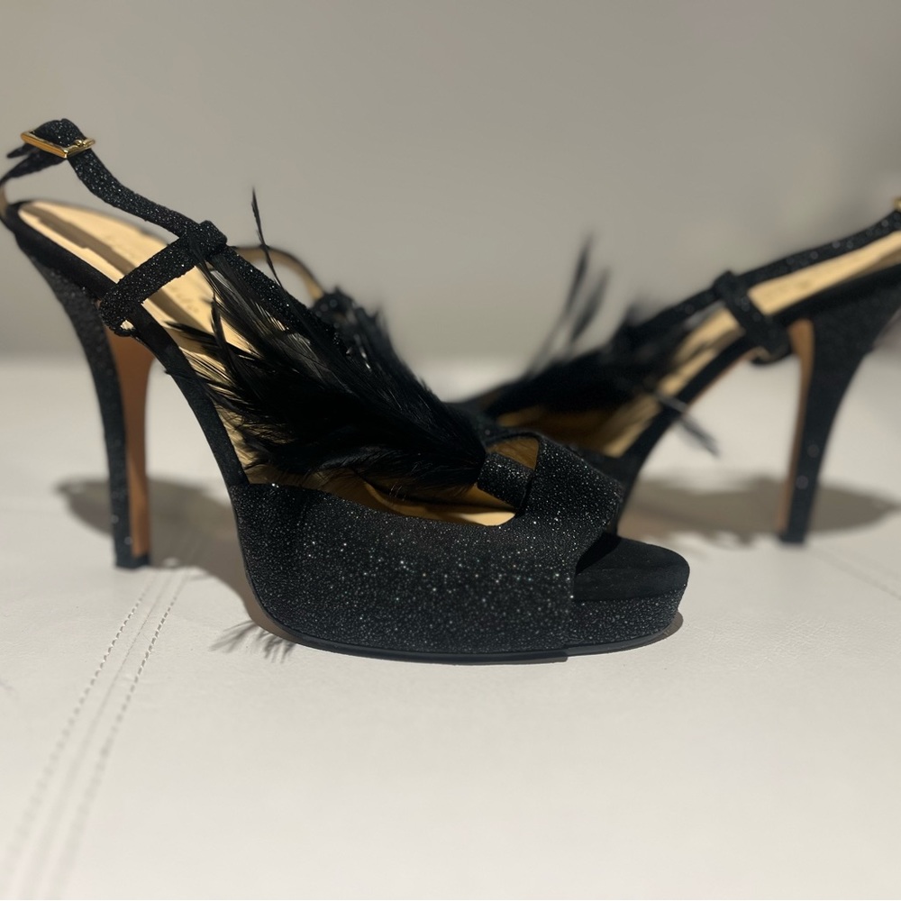 Kate Spade Size 8.5 black sparkly sling back pump with feather detail